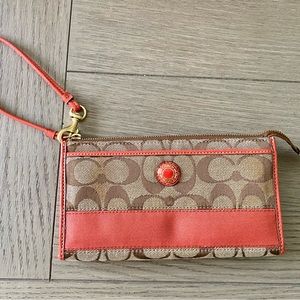 Coach corner zip wristlet in signature canvas